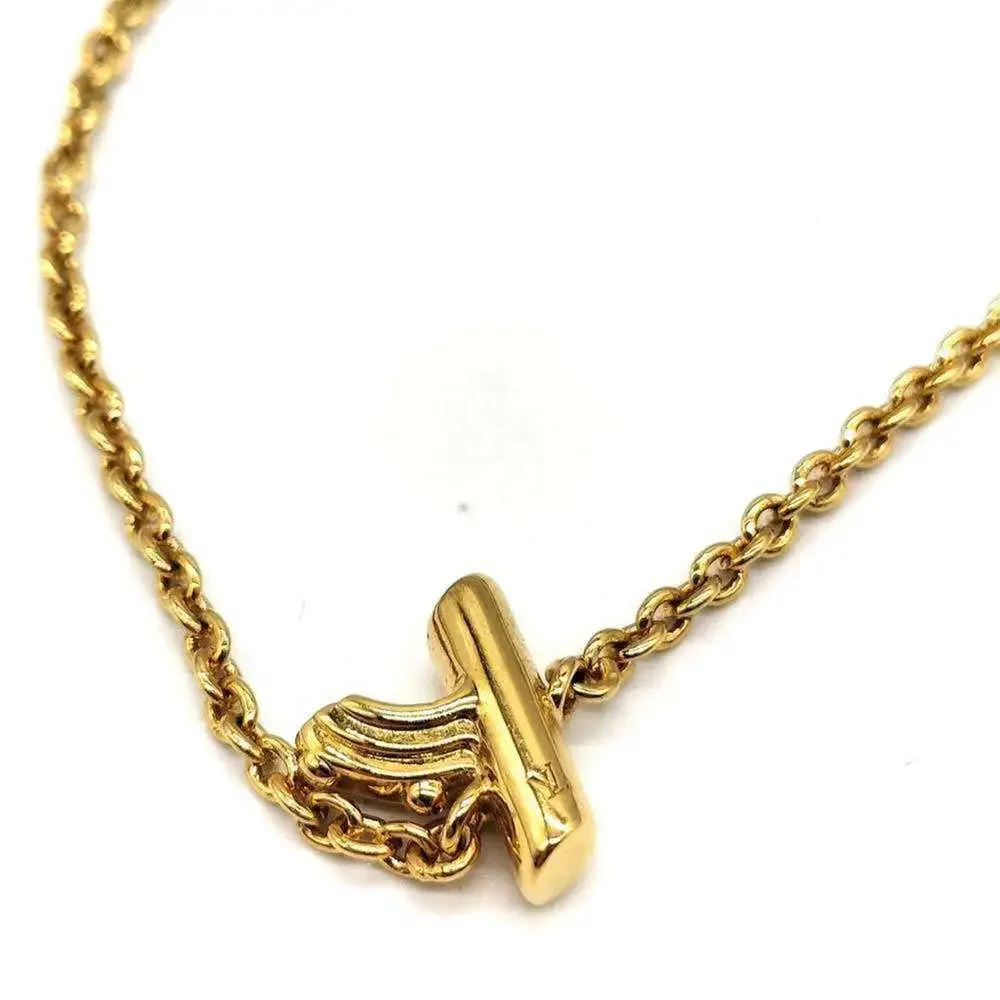 LOUIS VUITTON Gold Charm Bracelet